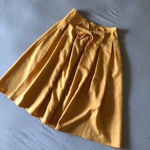 Goldenrod past knee-length skirt with bow NWT